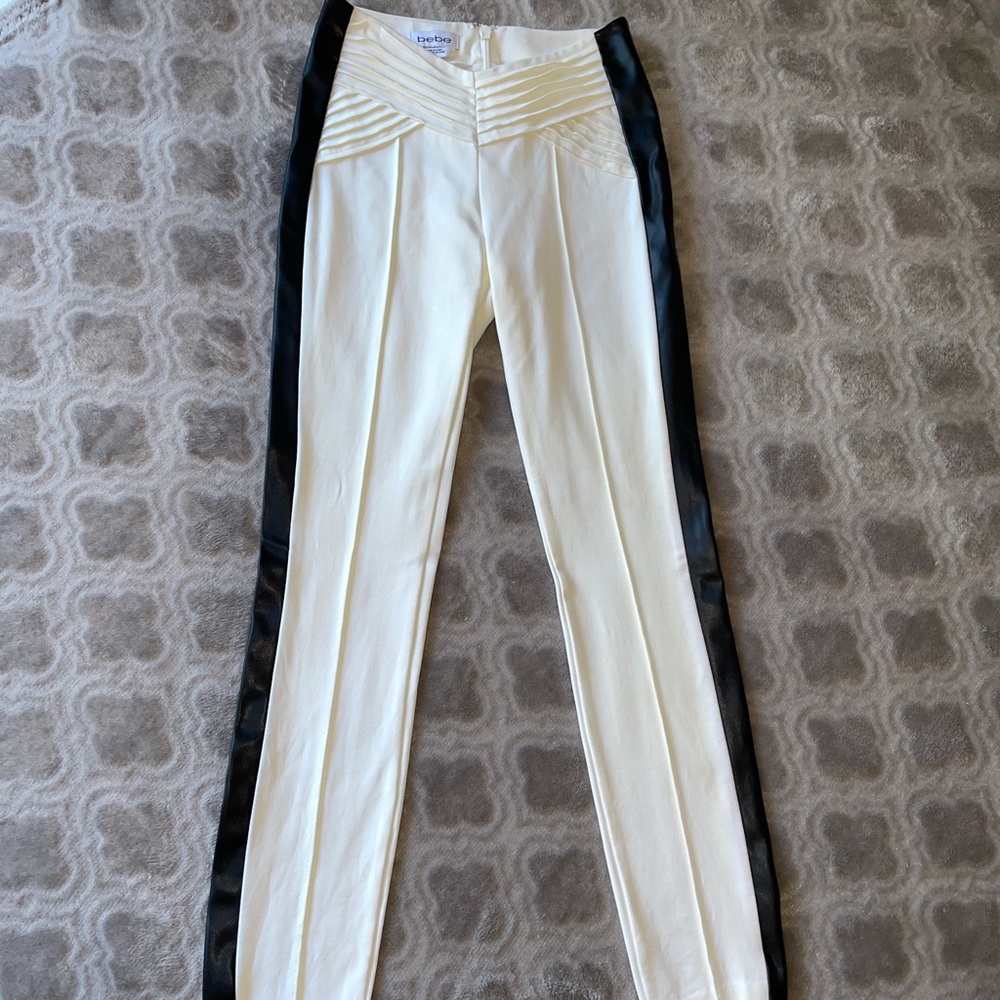 Dressy white pants with black stripe on the side